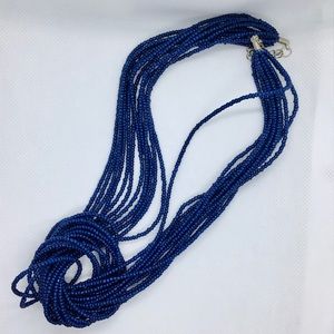 Navy blue beaded necklace.